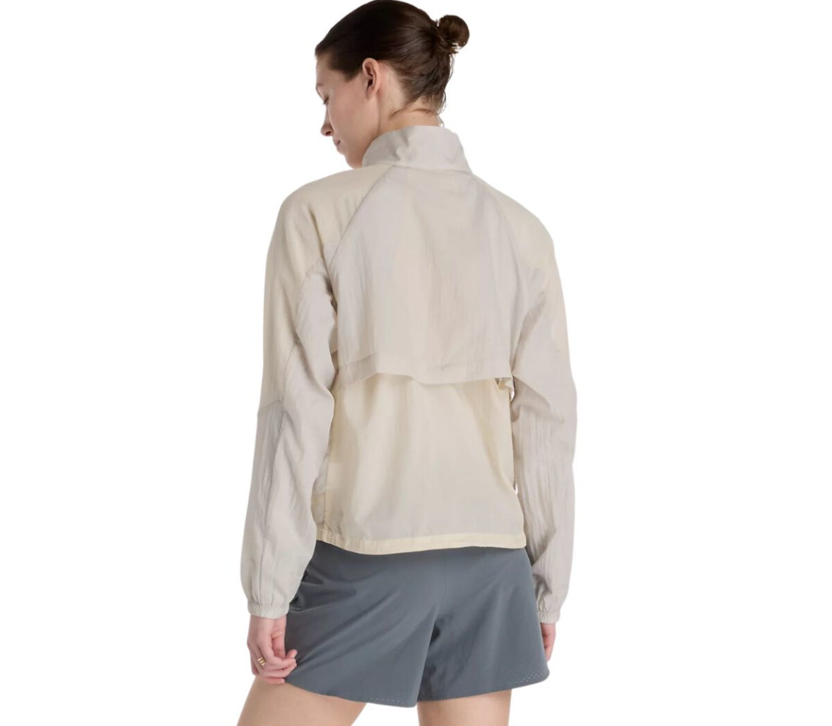 Dietro Giacca New Balance Better Run Water Resistant Jacket donna beige chiaro